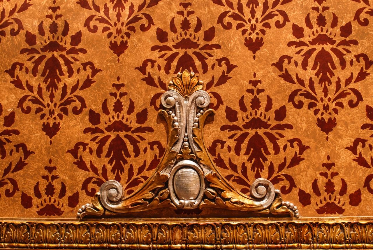 Detailed image of Victorian architecture showcasing intricate wall decor in Chatham, Ontario.